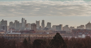 Harvard stadium against Boston cityscape